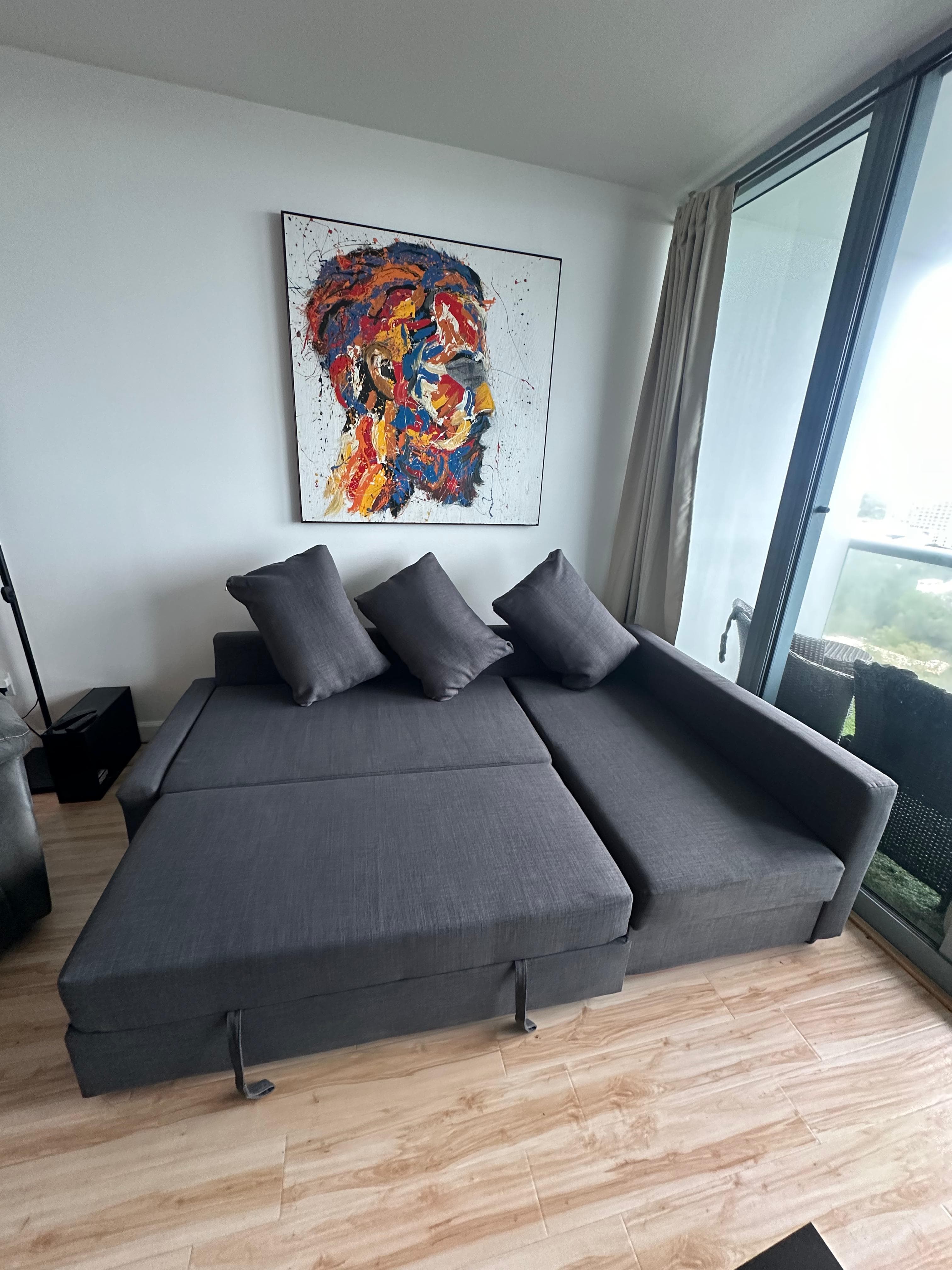 Real gray sofa in a clean Miami interior